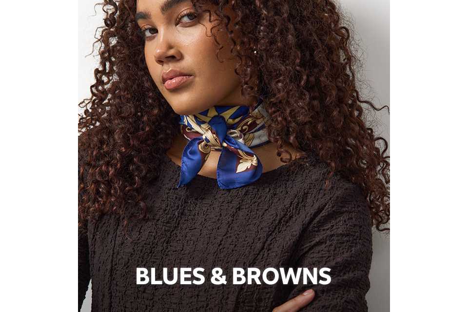 Women wearing brown textured dress and blue neck scarf.