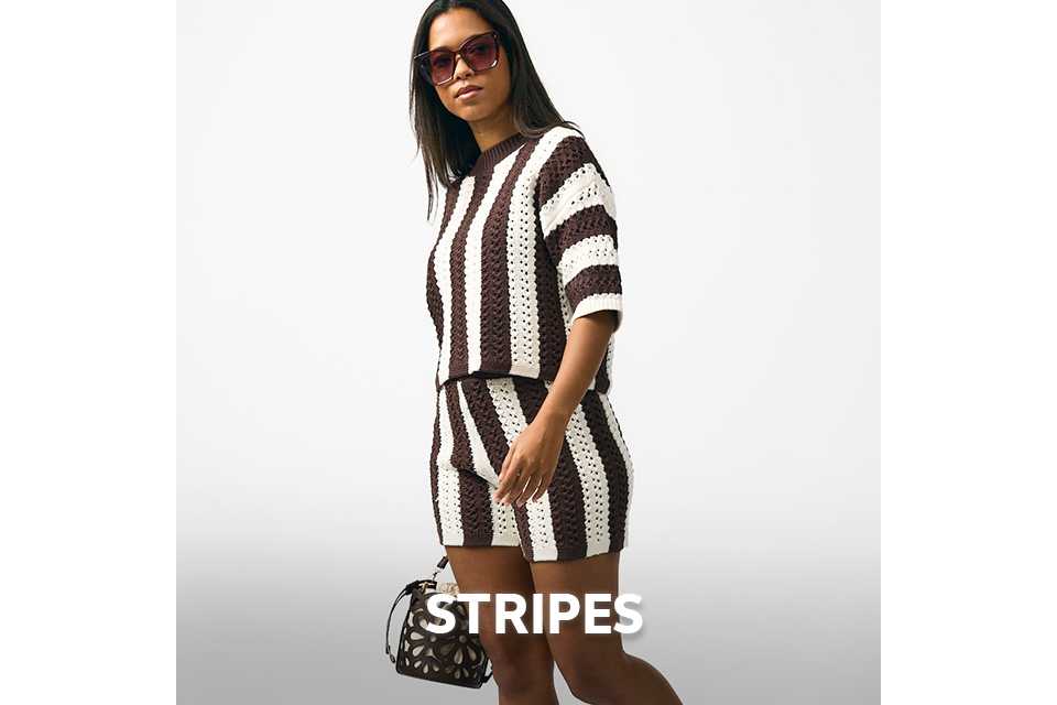 Woman wearing brown and cream crochet stripe co-ord.