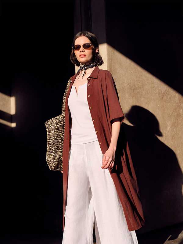 Lean into linen. Slip into pure elegance this spring with our minimalist linen. Nail your holiday look with relaxed shirts, lightweight trousers and effortless dresses, perfect for pairing with swimwear or denim for the day to night look. Switch it up from fresh white to earthy neutrals and rich blue.