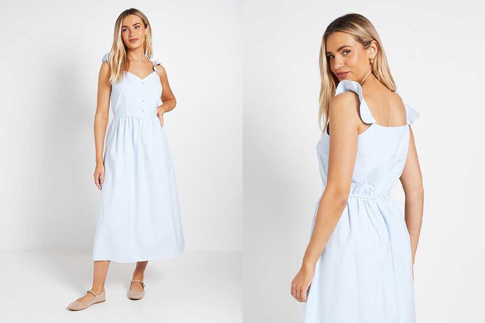 Back view of a pale blue sleeveless midi dress with soft fabric drape for evening wedding wear.