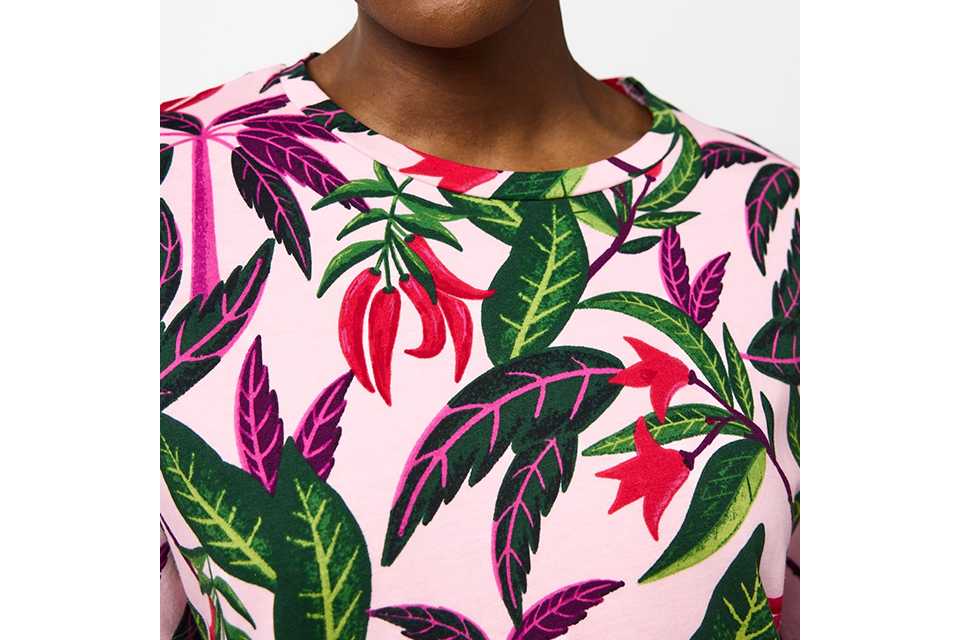 Tropical floral print nightwear top with bold leaf and flower pattern.