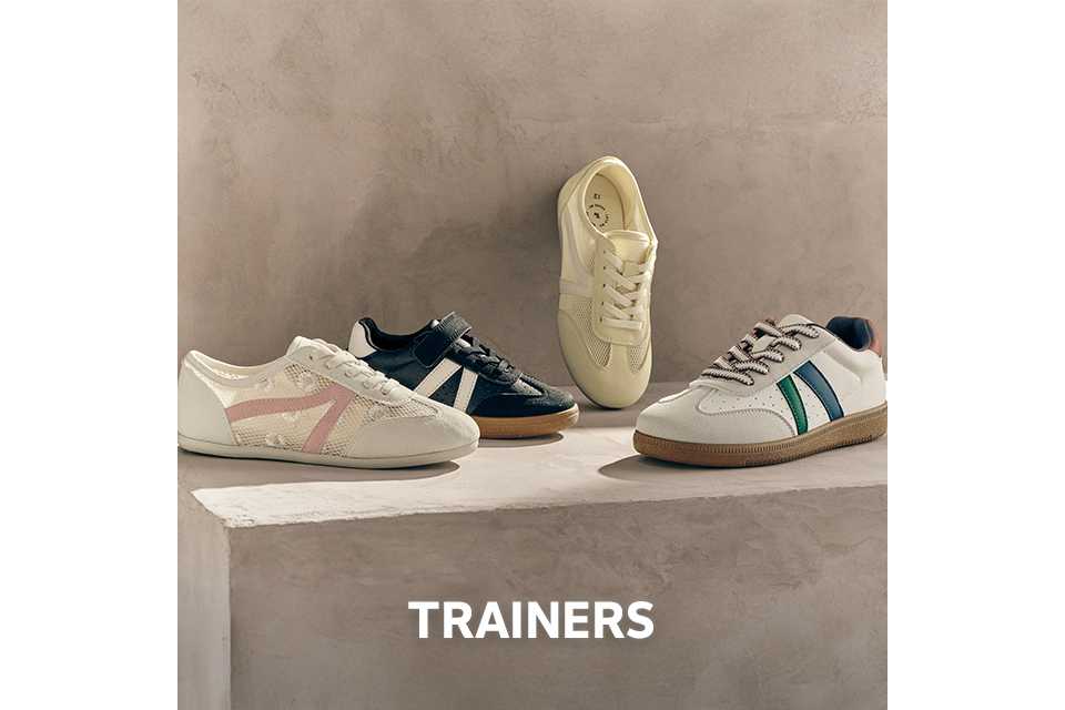 Assorted women’s retro trainers in neutral, black and pastel tones styled as casual everyday footwear.