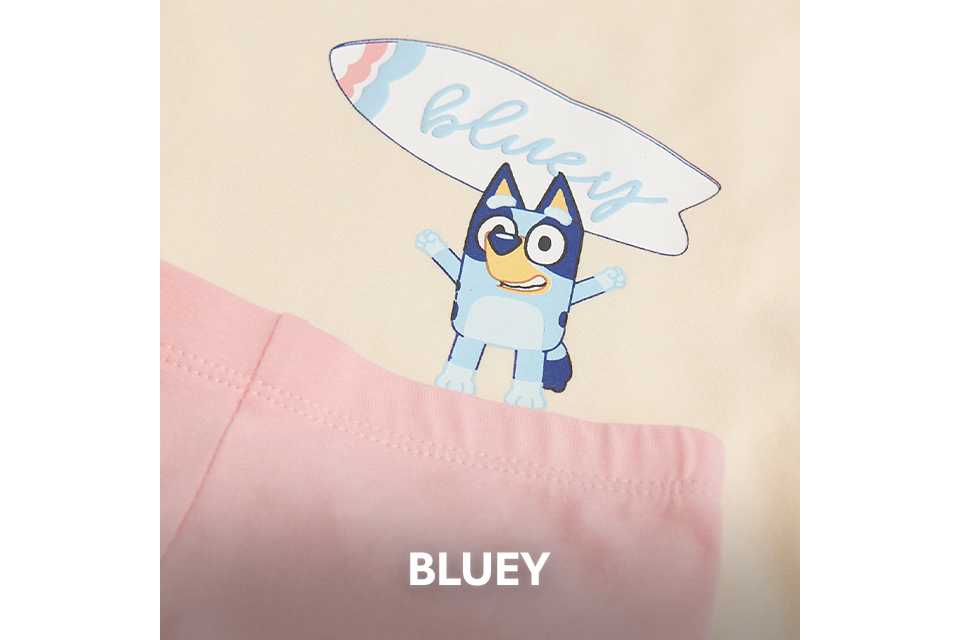 Close up shot of a piece of kids clothing showing a bluey motif.