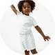 Kids' white short-sleeve top and matching shorts set featuring a delicate blue floral print and soft ribbed texture.