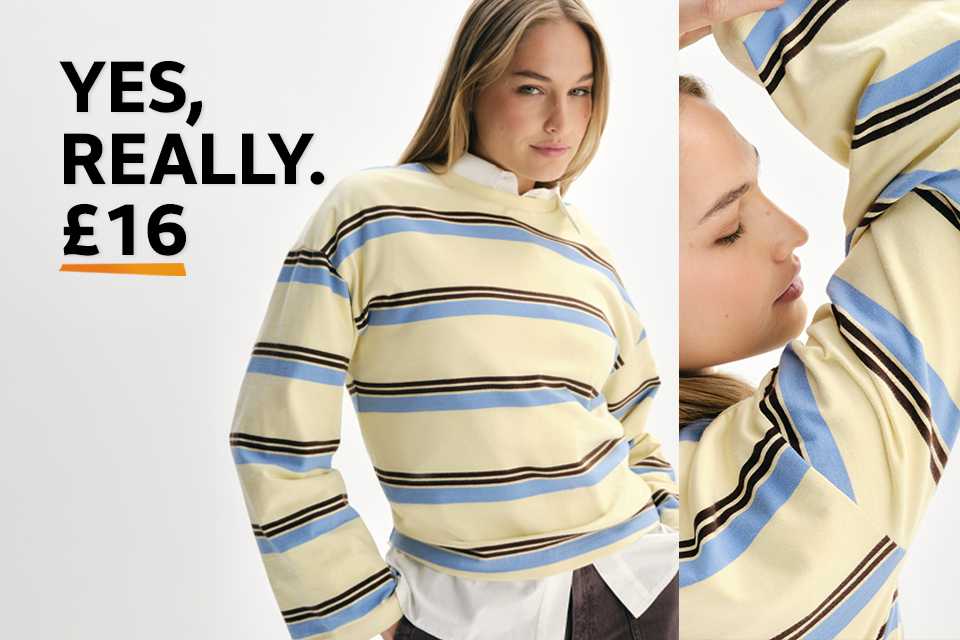 Woman wearing a stripey long sleeve cotton top.