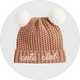 Pink baby pom-pom beanie with waffle-knit texture and embroidered "cute club" slogan.