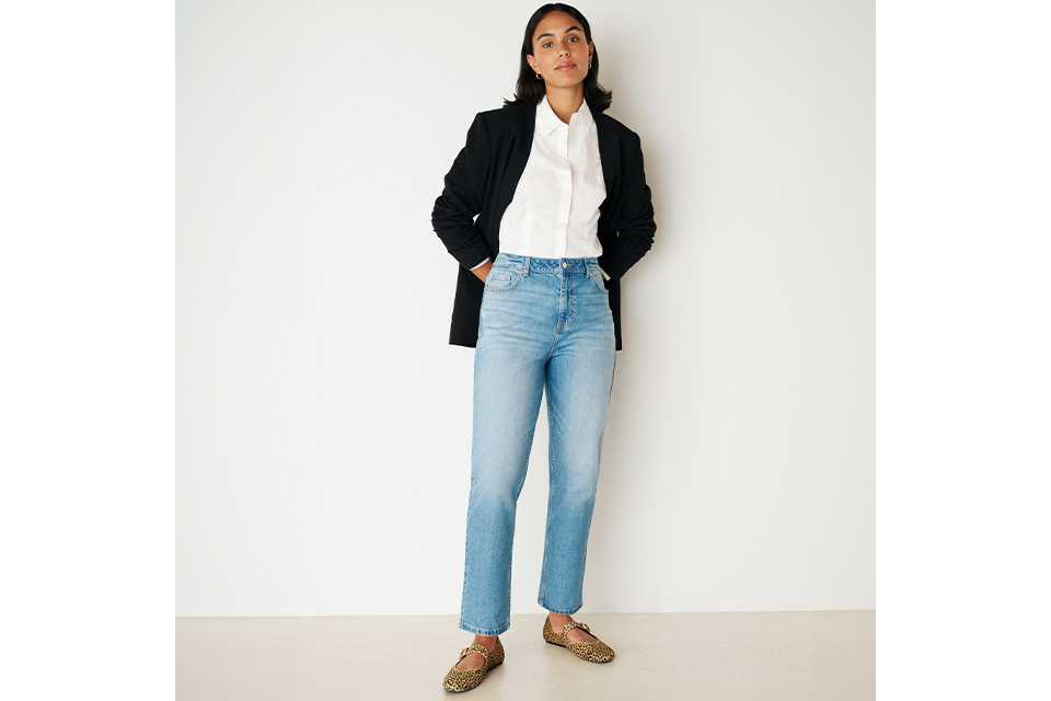 model wearing denim jeans.