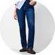 Blue striped button-down shirt paired with dark wash straight-leg jeans.