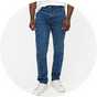 Men's white crew neck T-shirt paired with blue slim-fit jeans and white trainers for a casual everyday look.