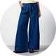 Wide-leg denim trousers with a tie-waist belt and relaxed fit.