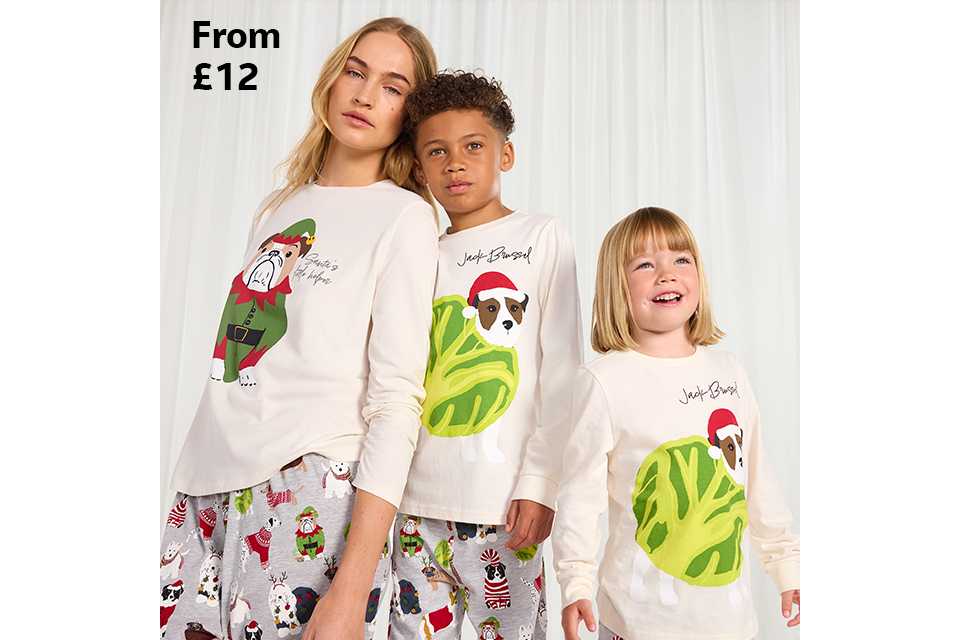 Family wearing matching christmas pyjamas.