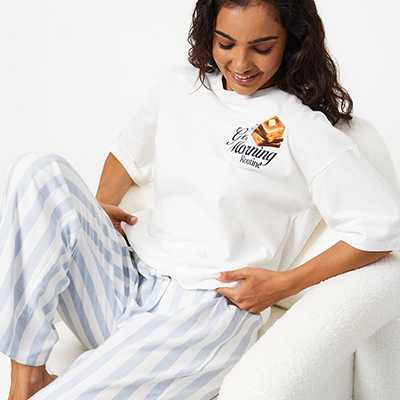 Women's cotton pyjamas with striped trousers and short-sleeve top, lightweight breathable nightwear for everyday comfort.