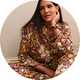Women's Christmas pyjamas featuring festive winter prints and cosy nightwear styles.