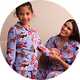 Matching festive Christmas pyjamas for a cosy seasonal night in with friends.
