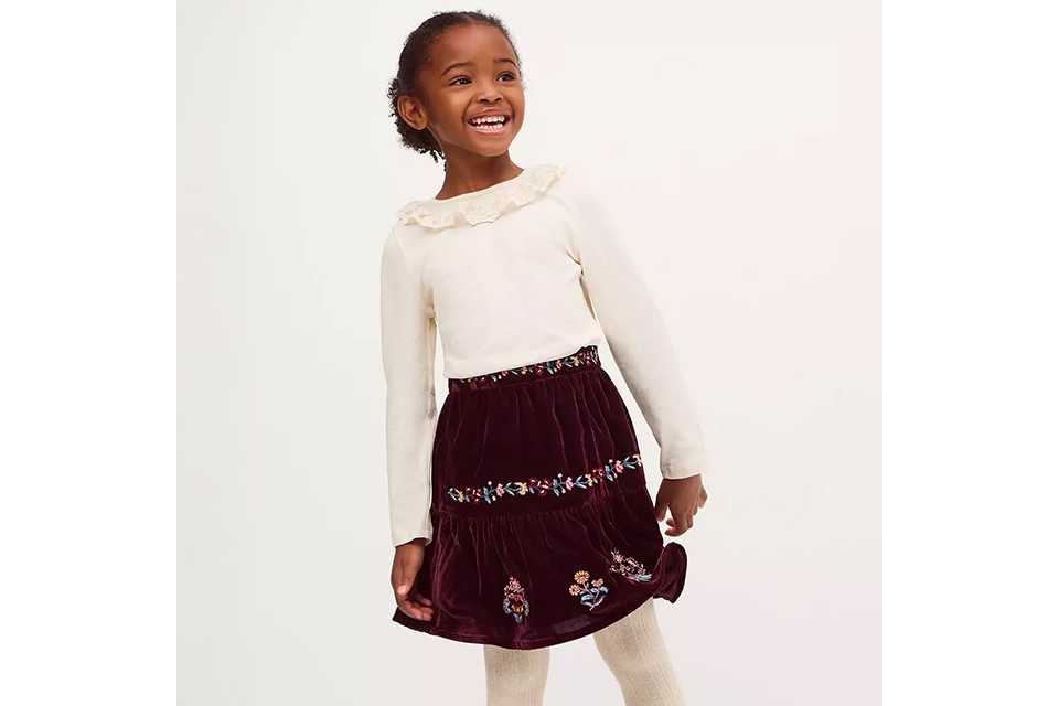 Children's ivory long-sleeve top with frill lace collar and a burgundy embroidered velvet skirt.