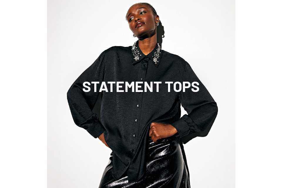 Woman wearing black shirt with embellished collar.