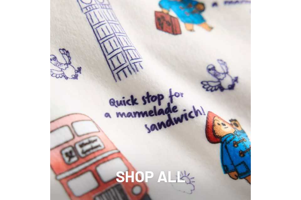 Light green textured nightdress with short sleeves, displayed on a person standing against a plain background.