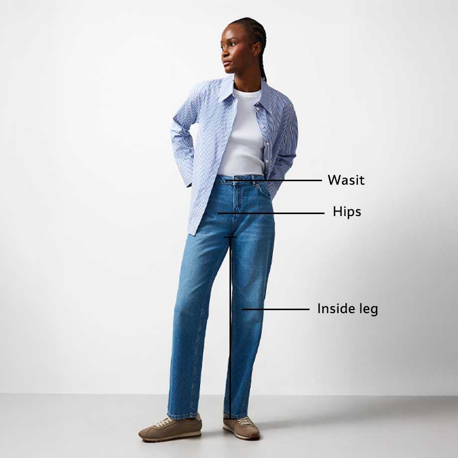 Person wearing a black-and-white striped top and high-waisted blue jeans, with labels indicating waist, hips, and inside leg measurements.