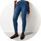 Slim-fit blue jeggings paired with casual shoes for a sleek look.