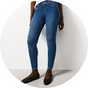 Slim-fit blue jeggings paired with casual shoes for a sleek look.