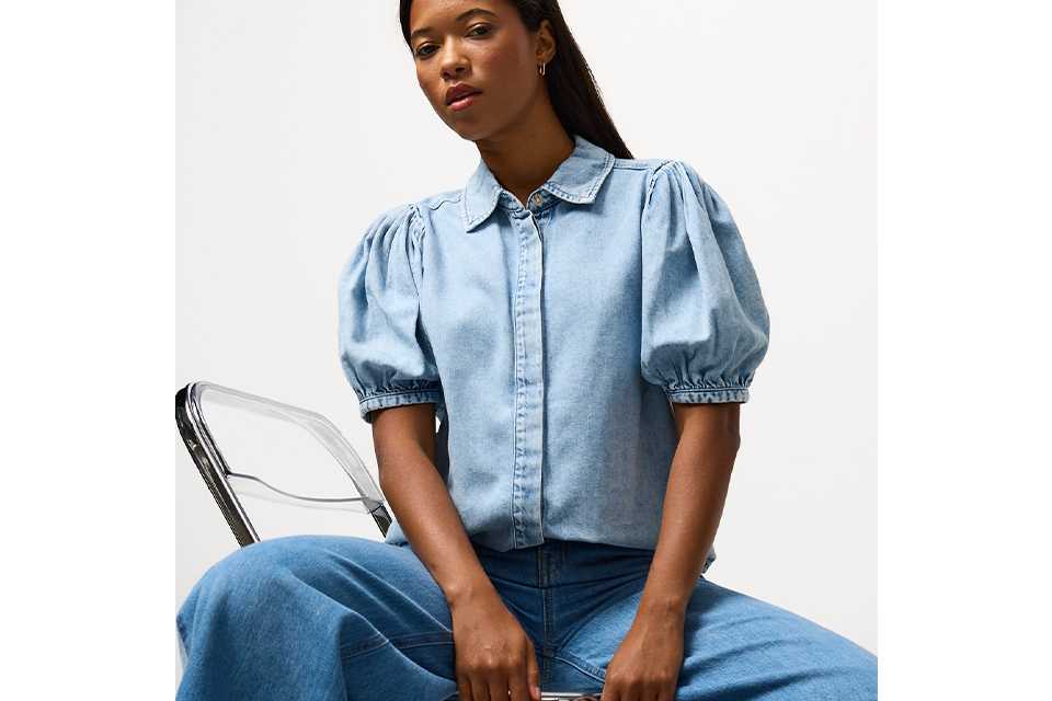 Jeans and the classic shirt.