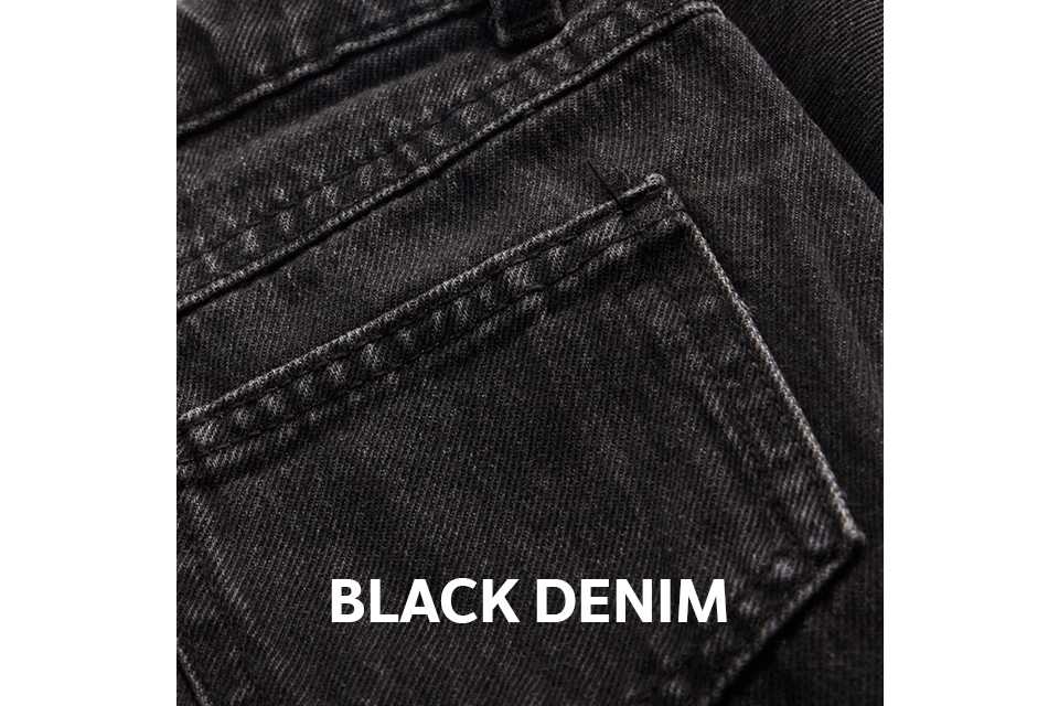 Close-up of the back pocket and waistband of black denim jeans, featuring tonal stitching and a classic five-pocket design.