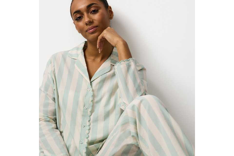 Red and white vertical striped pyjama bottoms.