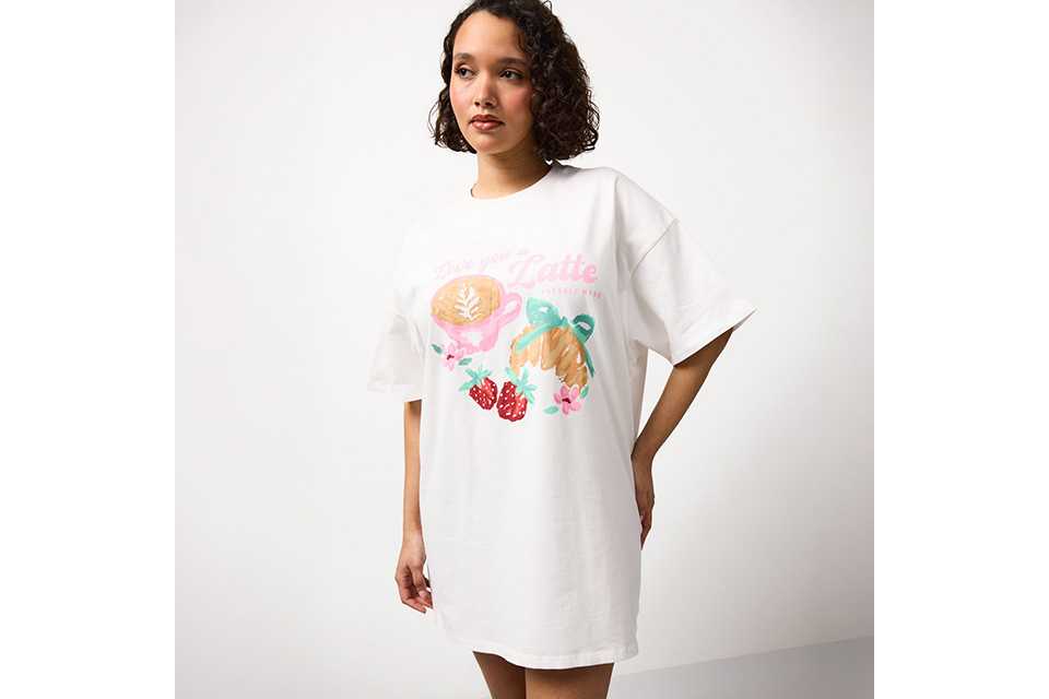 White top with pancake stack illustration and slogan on the back.