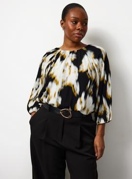 The Bubble Hem Blouse