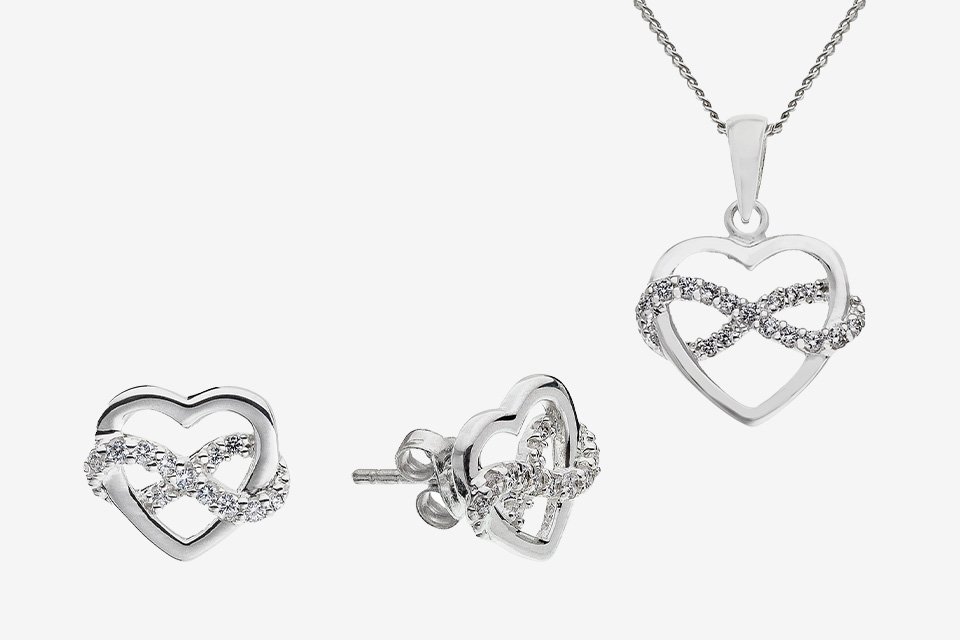 Revere silver jewellery set with cubic zirconia heart pendant and earrings.