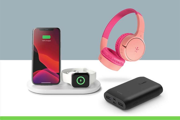 A selection of Belkin products including headphones, a power bank and wireless charger.
