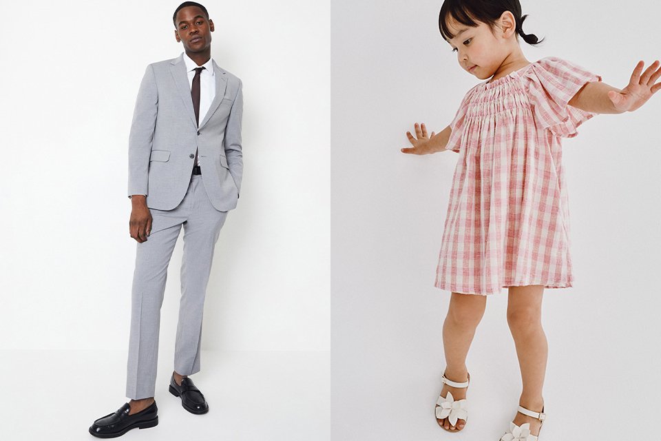 Matching occasionwear outfits featuring a light grey tailored suit with tie and black shoes alongside a pink gingham short‑sleeve dress styled with white sandals, shown on a clean studio background.