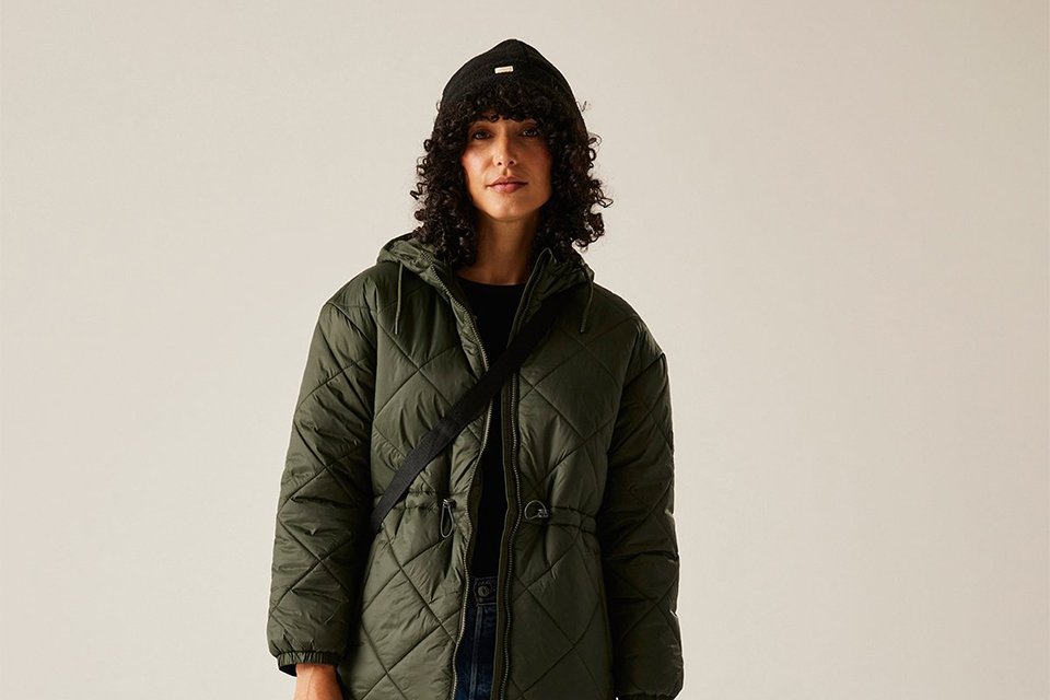 A woman in a REGATTA Ivey quilted jacket in khaki colour.