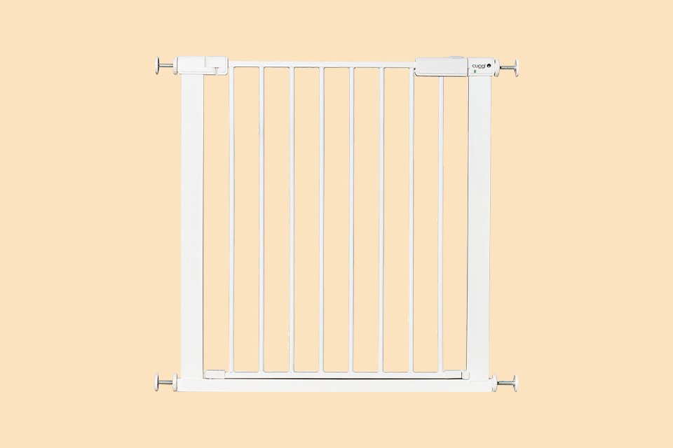 A white Cuggl baby gate.