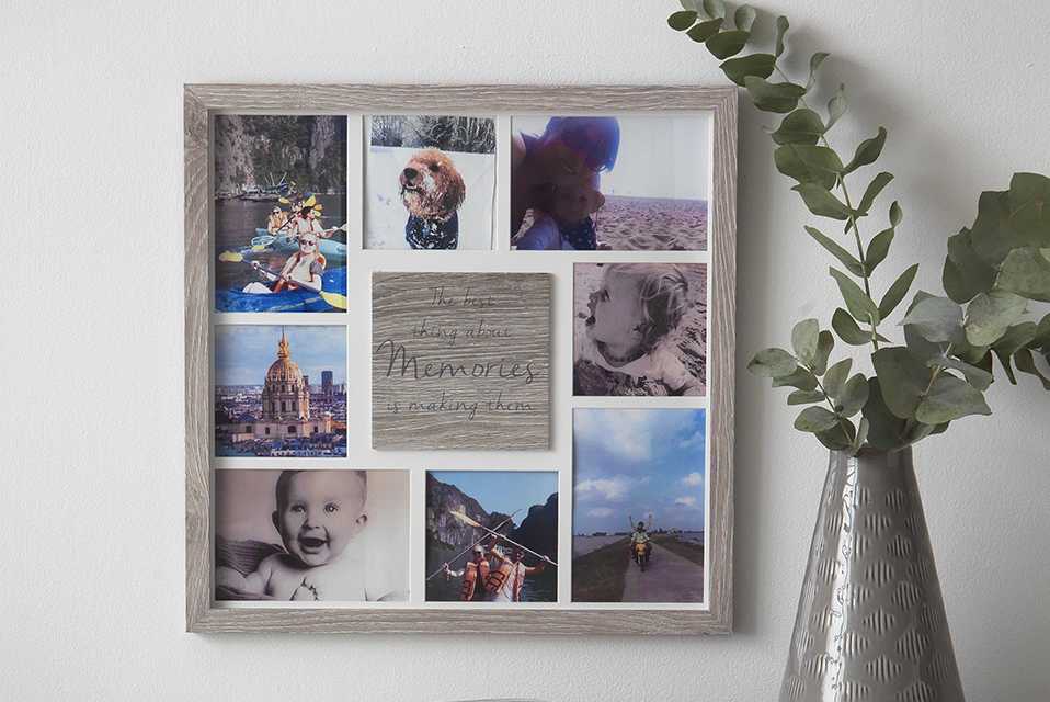 Photo collage in wooden frame hanging on wall.
