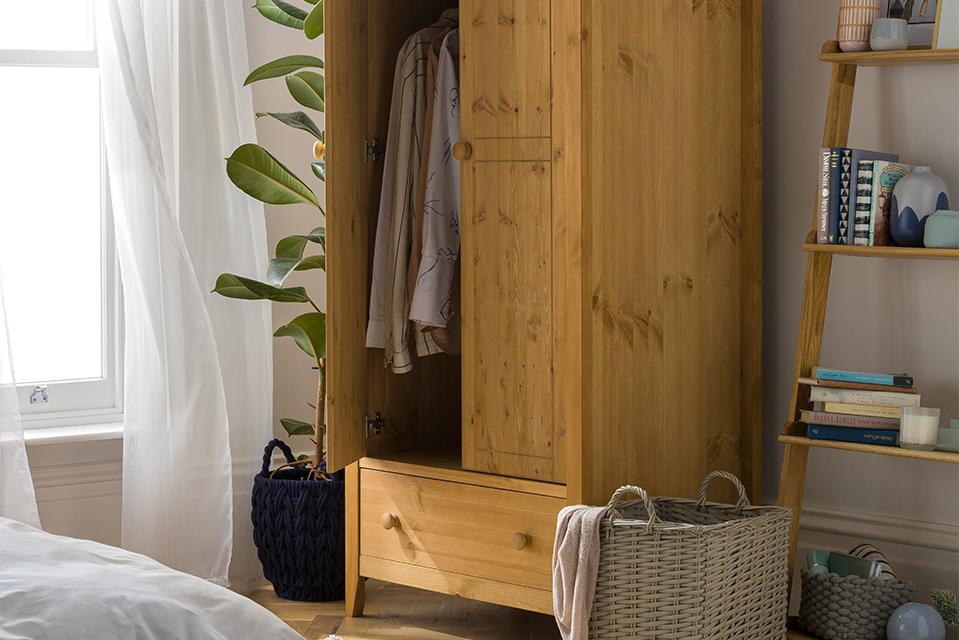 Image of a wooden two door wardrobe.