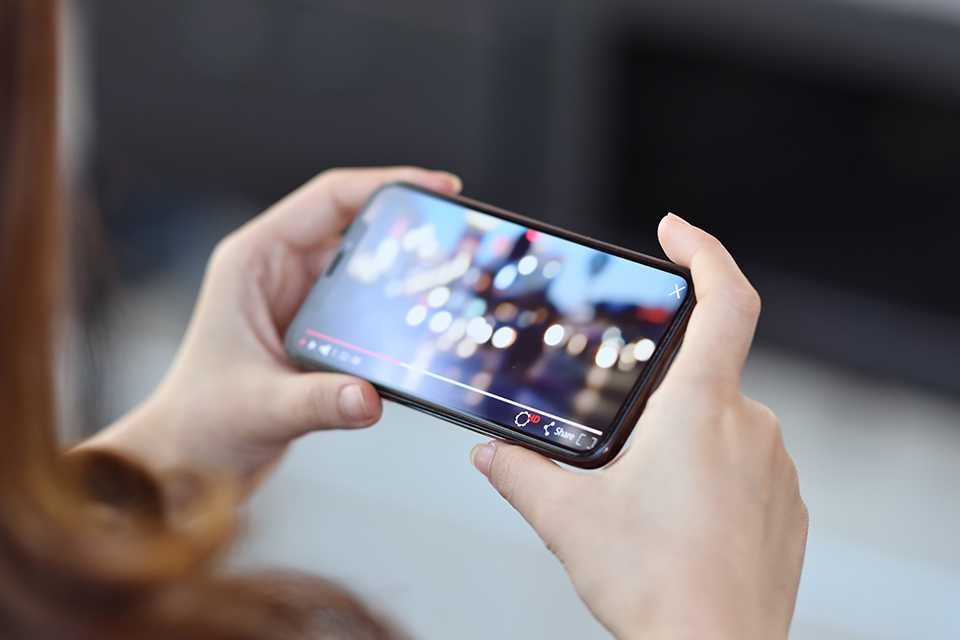 A person watching a video on their phone.