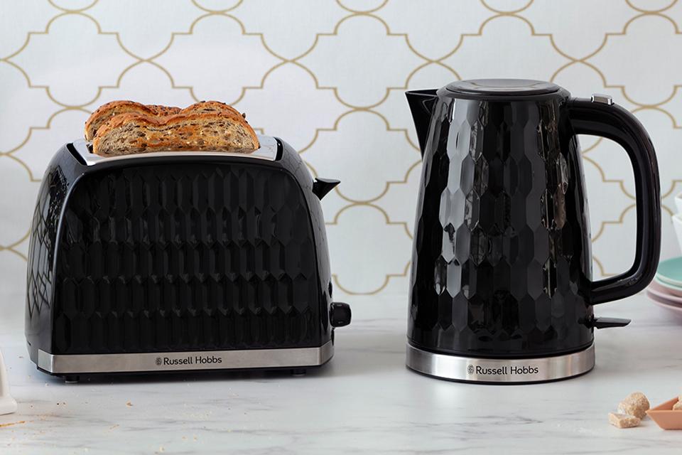 Image of a black toster and a black kettle