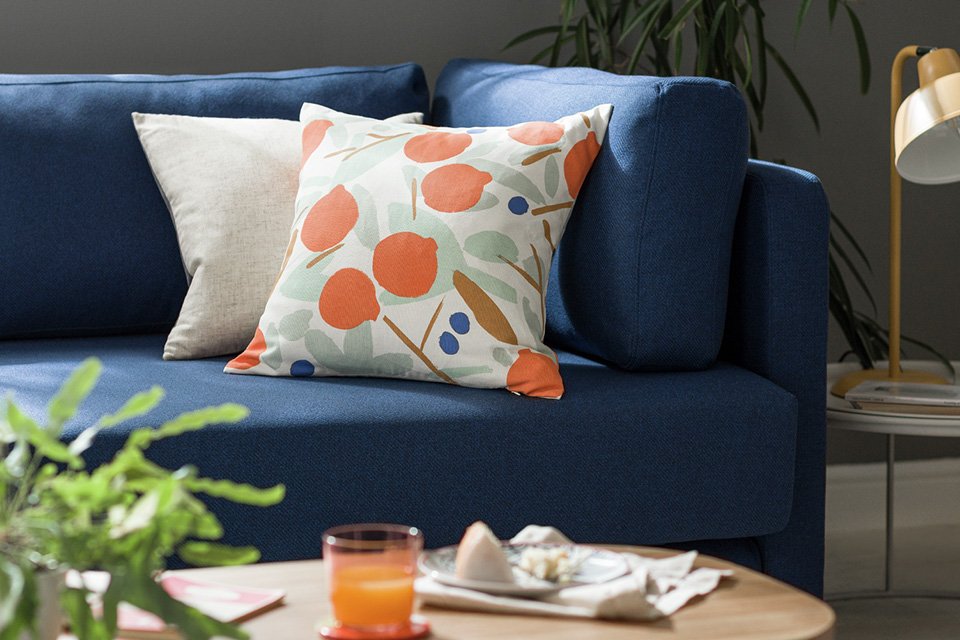 orange cushions and throws