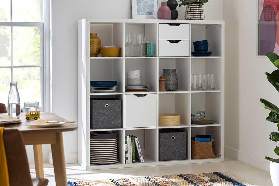Image of a white, open shelving cabinet.