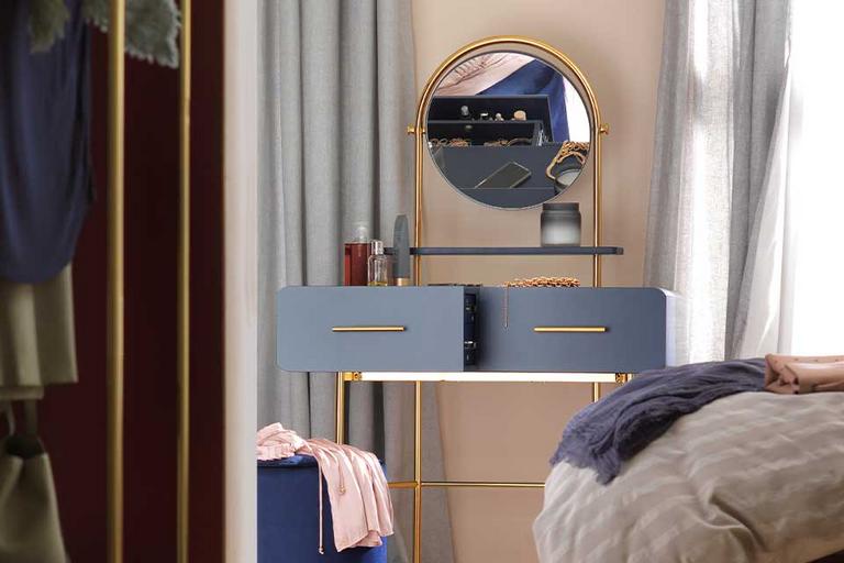 Blue and brass dressing table.
