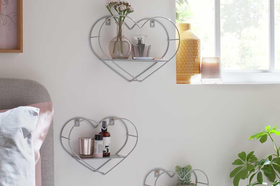 Image of grey, heart shaped shelves.