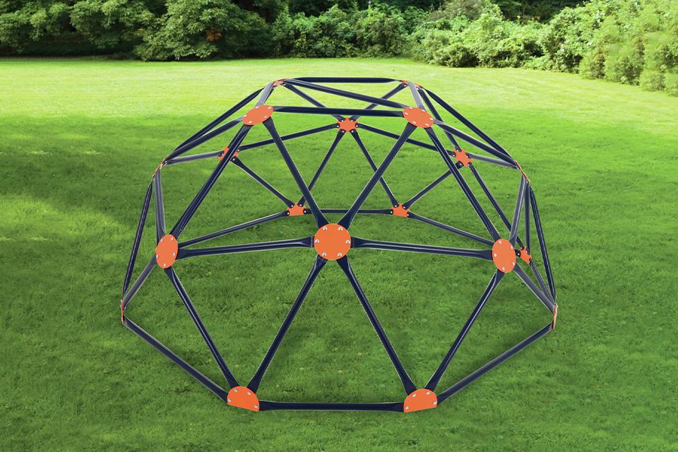 The Hedstrom climber in a garden - a dome-shaped climbing frame in black and orange.