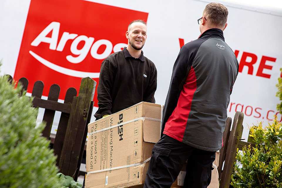 Argos delivery drivers delivering parcel.