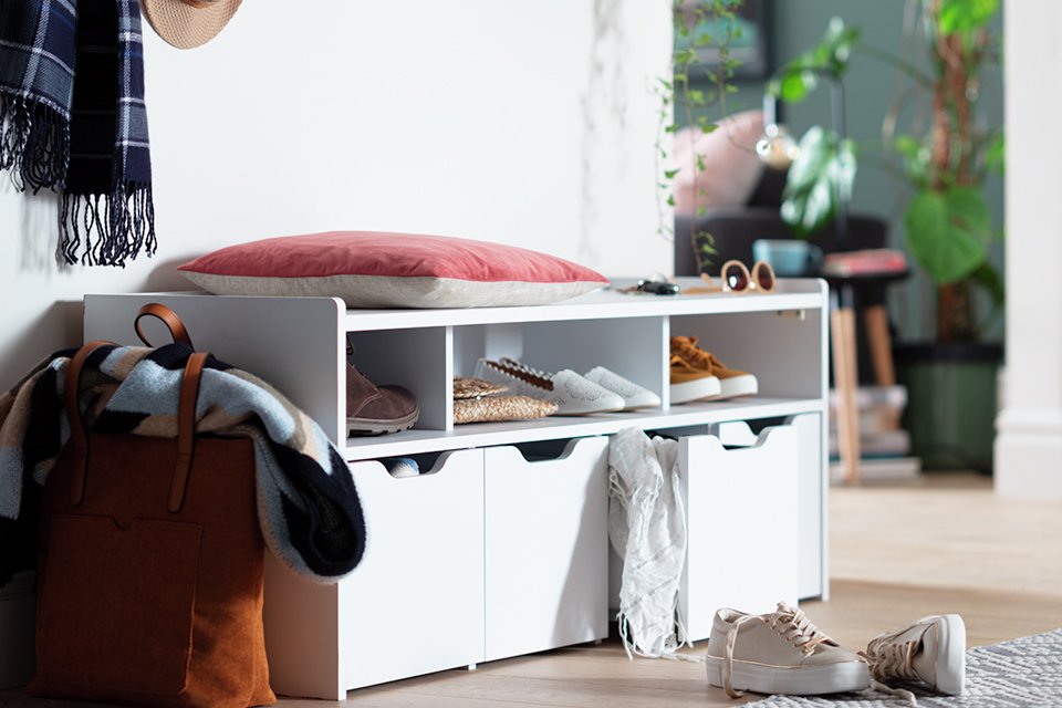 Habitat Compton 3 Shelf Shoe Bench in white colour placed in hallway with a cushion on top of it.