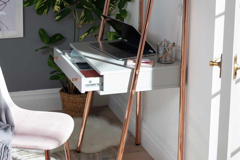 The Habitat Valence 1-drawer ladder desk with rose gold frame.