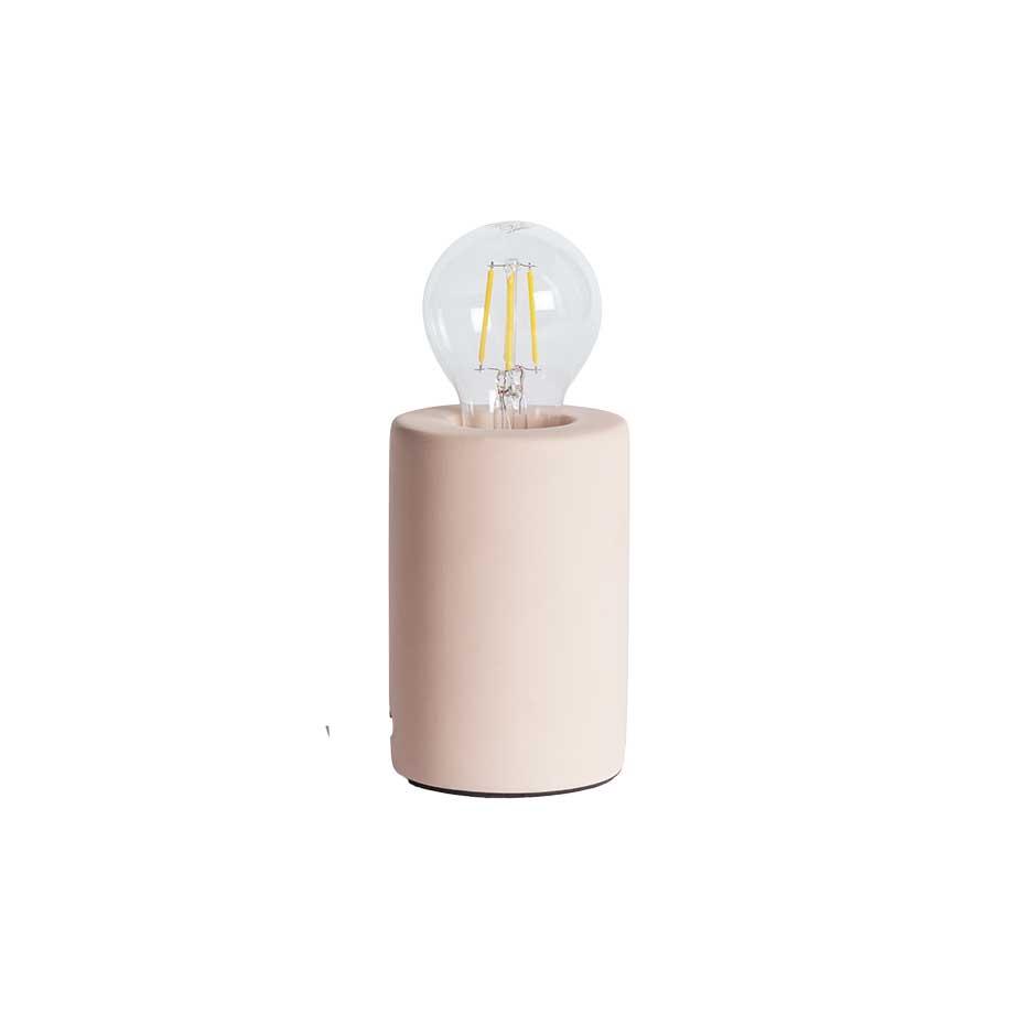 Rayner exposed bulb lamp with a matte pink base.