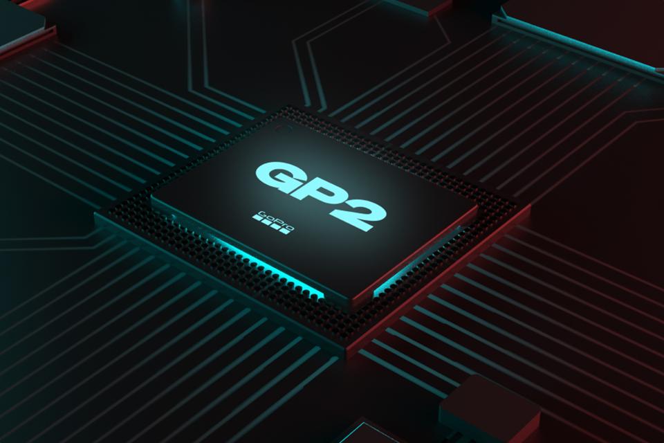 A GP2 processor with a GoPro logo on a black chipset circuit board.