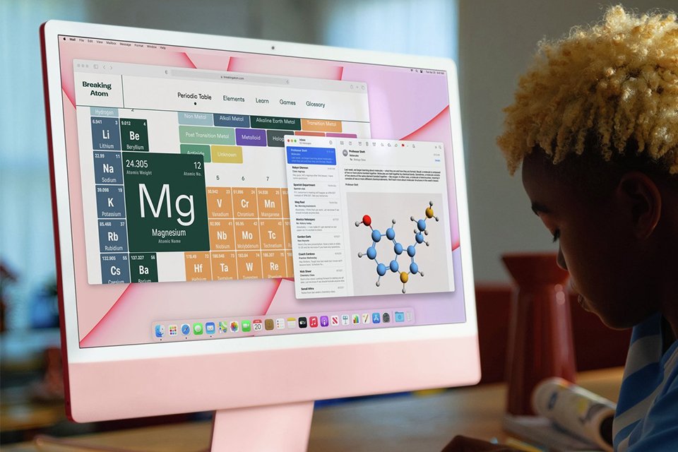 A kid studying on an Apple iMac 2021 24in Retina 4.5K Display M1 8 core GPU 512GB.