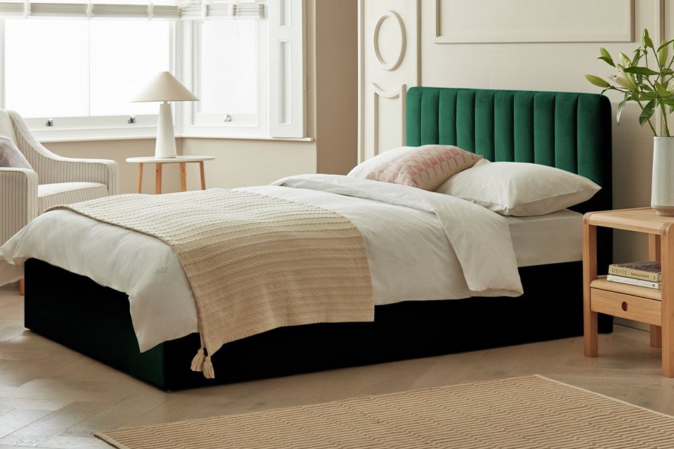 Wooden shoe storage in hallway.